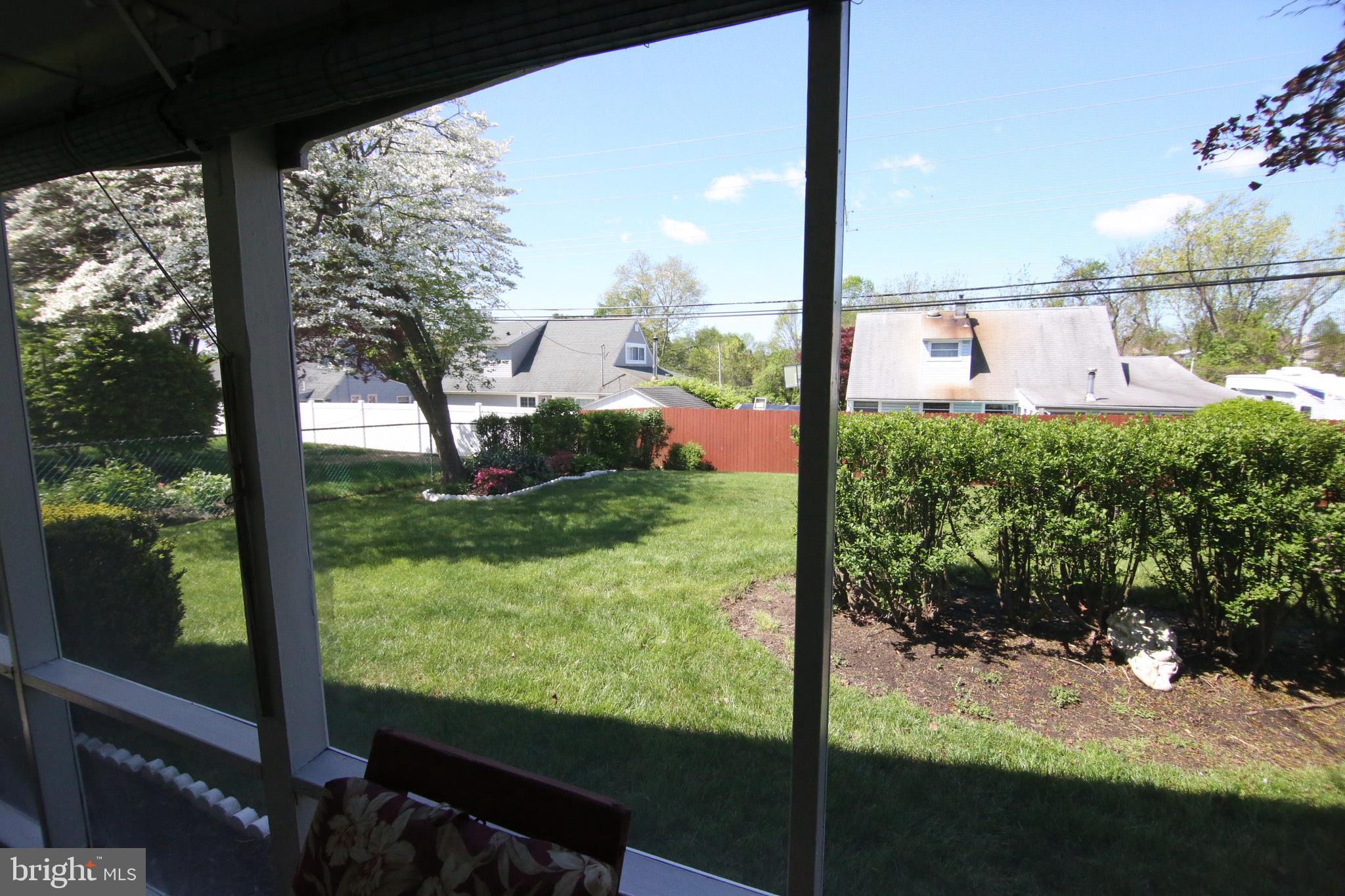 47 Trellis Road Levittown, PA 19056 - Photo 31 of 34 a view of a porch with a yard
