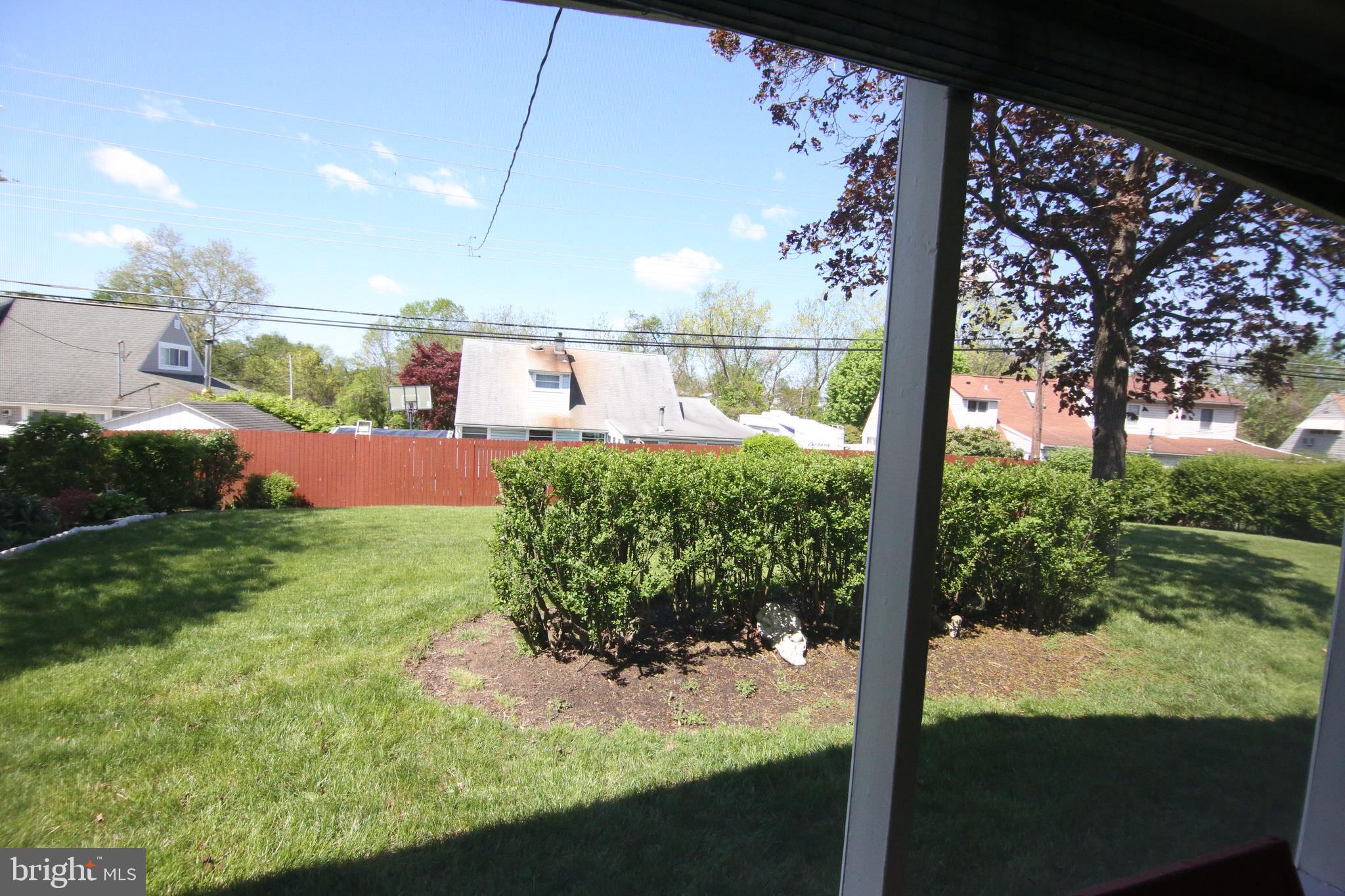 47 Trellis Road Levittown, PA 19056 - Photo 33 of 34 a view of a yard in front of a house