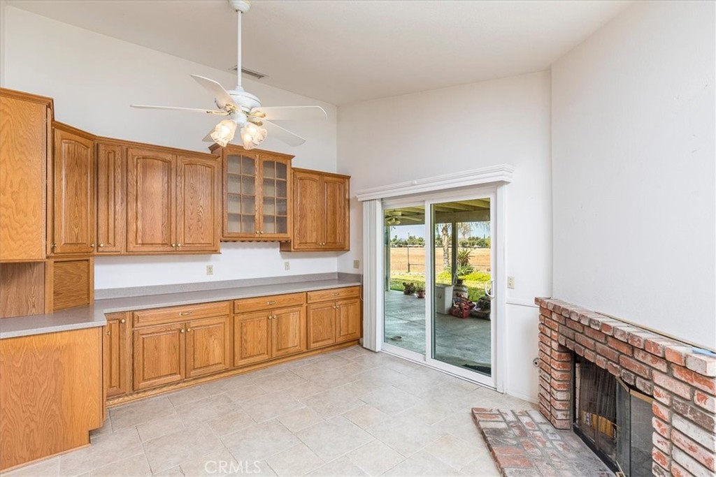 44194 Meadow Grove Street Hemet, CA 92544 - Photo 16 of 42 a view of a kitchen with granite countertop cabinets and a sink