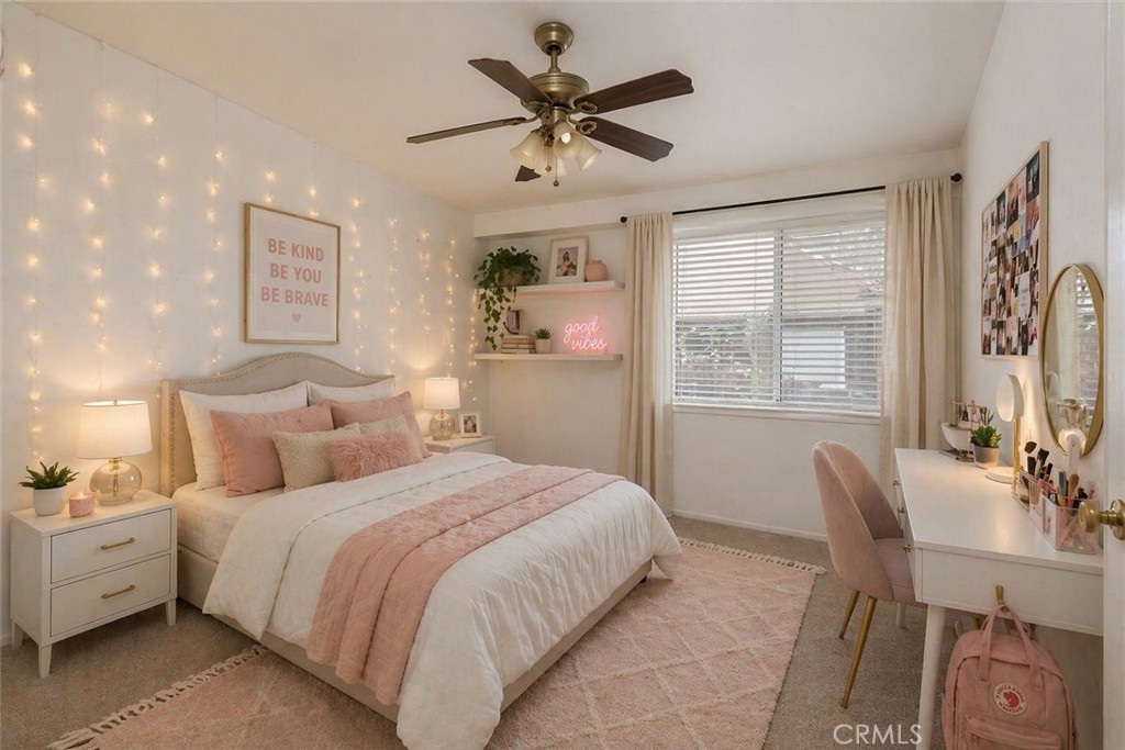44194 Meadow Grove Street Hemet, CA 92544 - Photo 24 of 42 a bedroom with bed and window