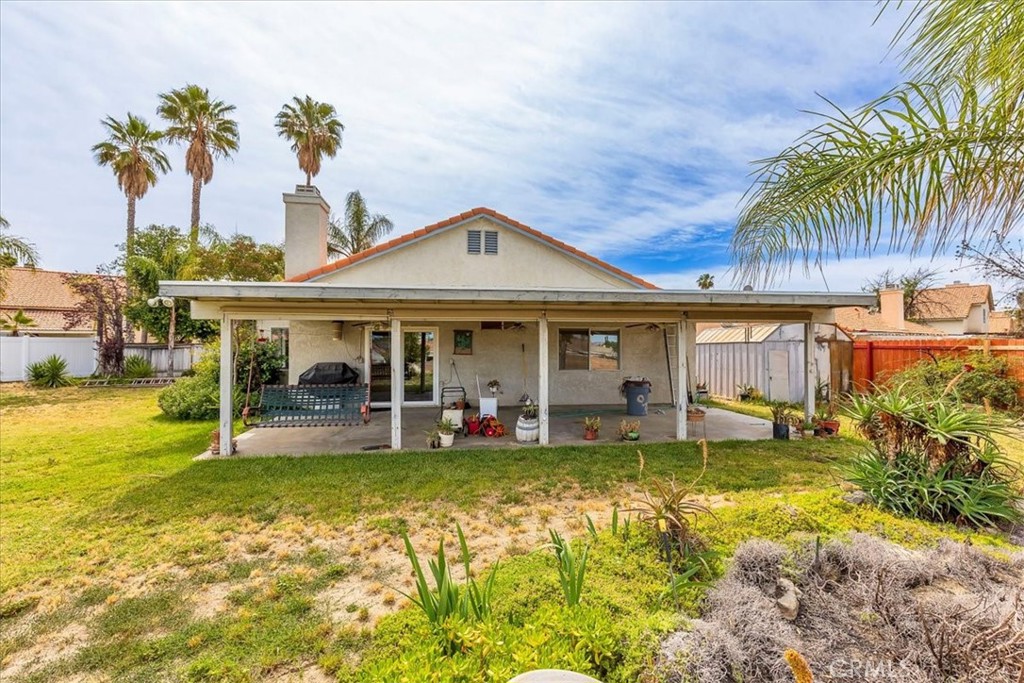 44194 Meadow Grove Street Hemet, CA 92544 - Photo 27 of 42 a view of a house with a swimming pool and sitting area
