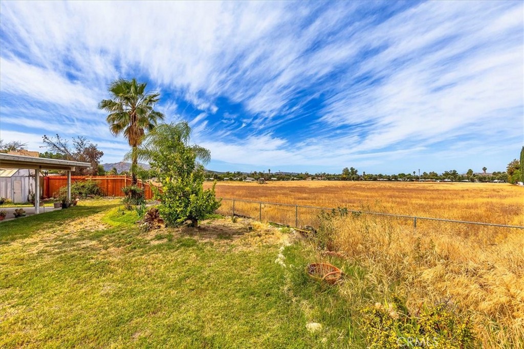 44194 Meadow Grove Street Hemet, CA 92544 - Photo 32 of 42 a view of a lake with a big yard
