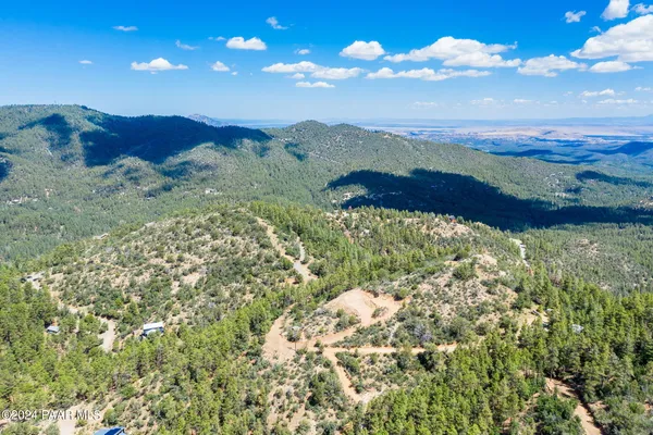 a view of mountain with sunset
