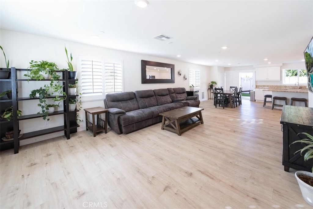 32078 Rambling Court Winchester, CA 92596 - Photo 10 of 48 a living room with furniture and a large window