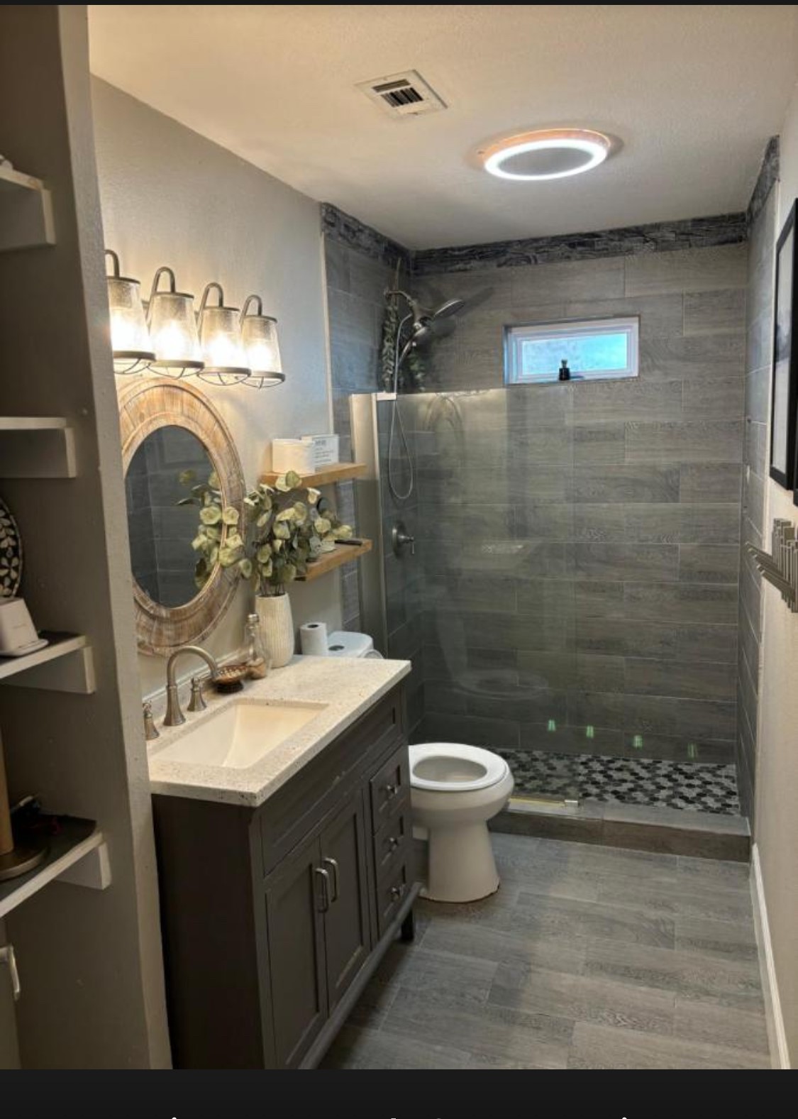 6811 St Augustine Street Houston, TX 77021 - Photo 8 of 20 a bathroom with a sink toilet a mirror and shower