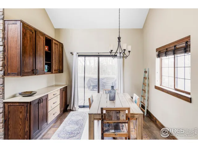 a open kitchen with stainless steel appliances granite countertop a stove top oven a sink and dishwasher