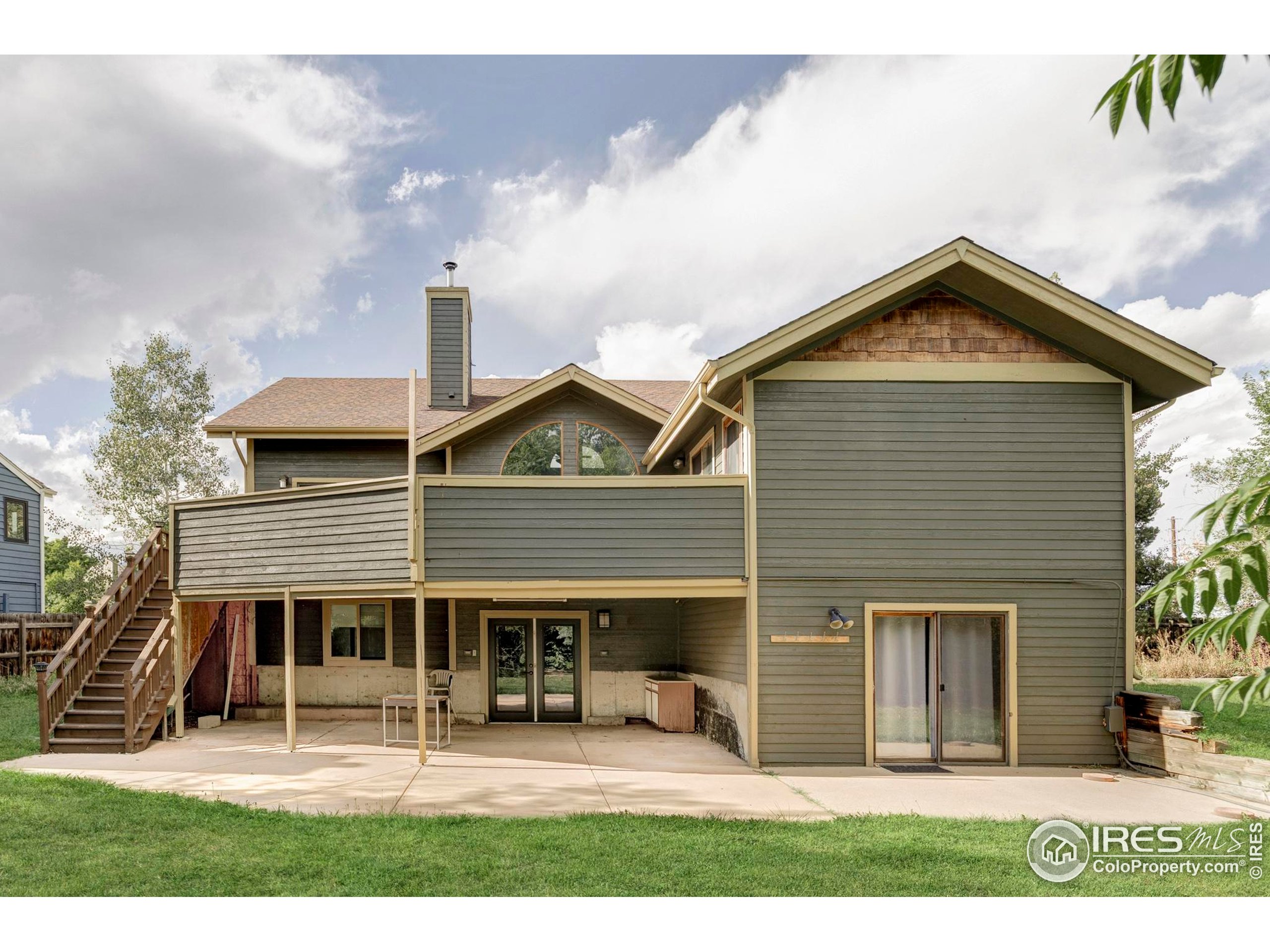 2770 Arbor Glen Place Boulder, CO 80304 - Photo 21 of 25 a view of a house with a yard and sitting area
