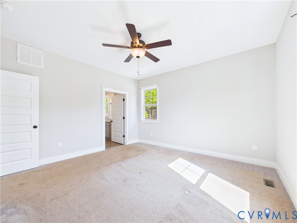6795 Darlington Heights Road Cullen, VA 23934 - Photo 14 of 42 Unfurnished bedroom with light carpet, a ceiling f