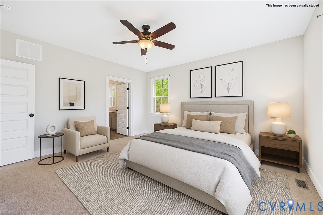 6795 Darlington Heights Road Cullen, VA 23934 - Photo 15 of 44 a bedroom with a bed and ceiling fan