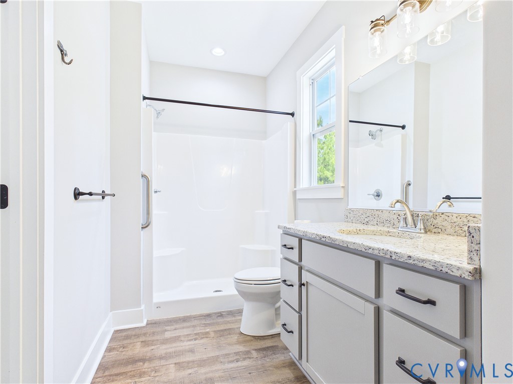 6795 Darlington Heights Road Cullen, VA 23934 - Photo 20 of 44 Full bathroom with vanity, light wood-type floorin