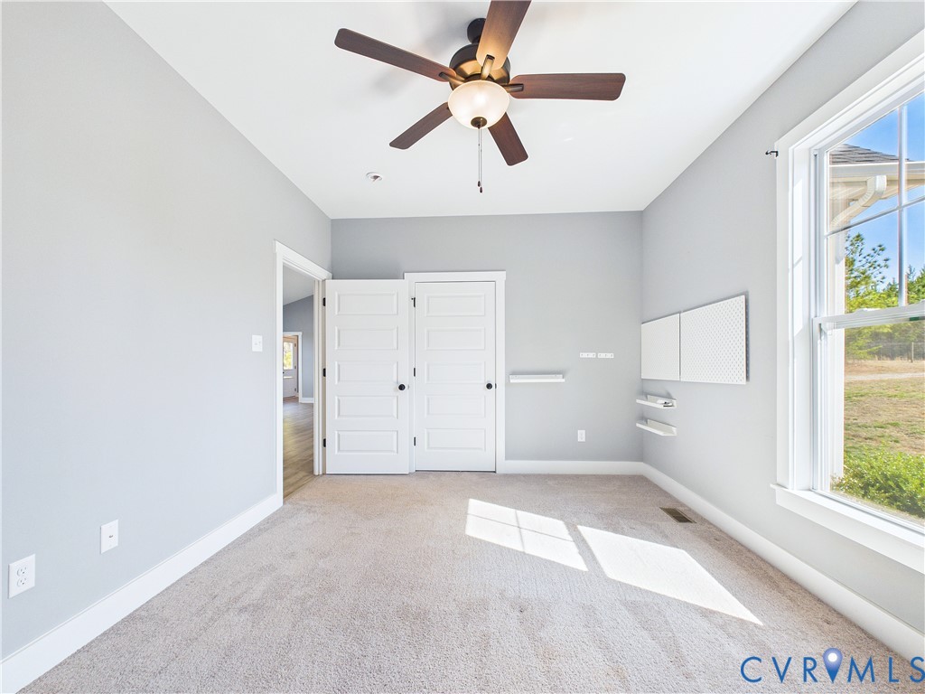 6795 Darlington Heights Road Cullen, VA 23934 - Photo 22 of 42 Unfurnished bedroom featuring light colored carpet