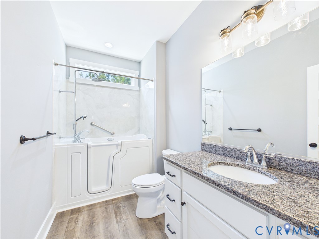 6795 Darlington Heights Road Cullen, VA 23934 - Photo 25 of 42 Bathroom with vanity and light wood-type flooring