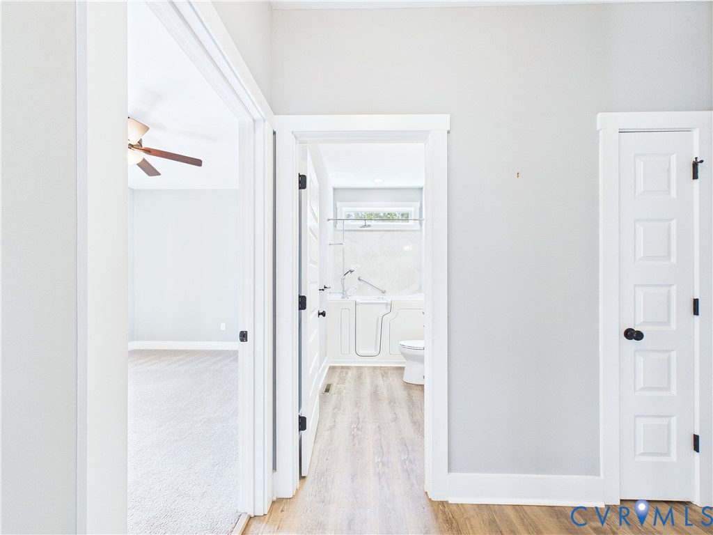 6795 Darlington Heights Road Cullen, VA 23934 - Photo 26 of 44 a view of a hallway with wooden floor