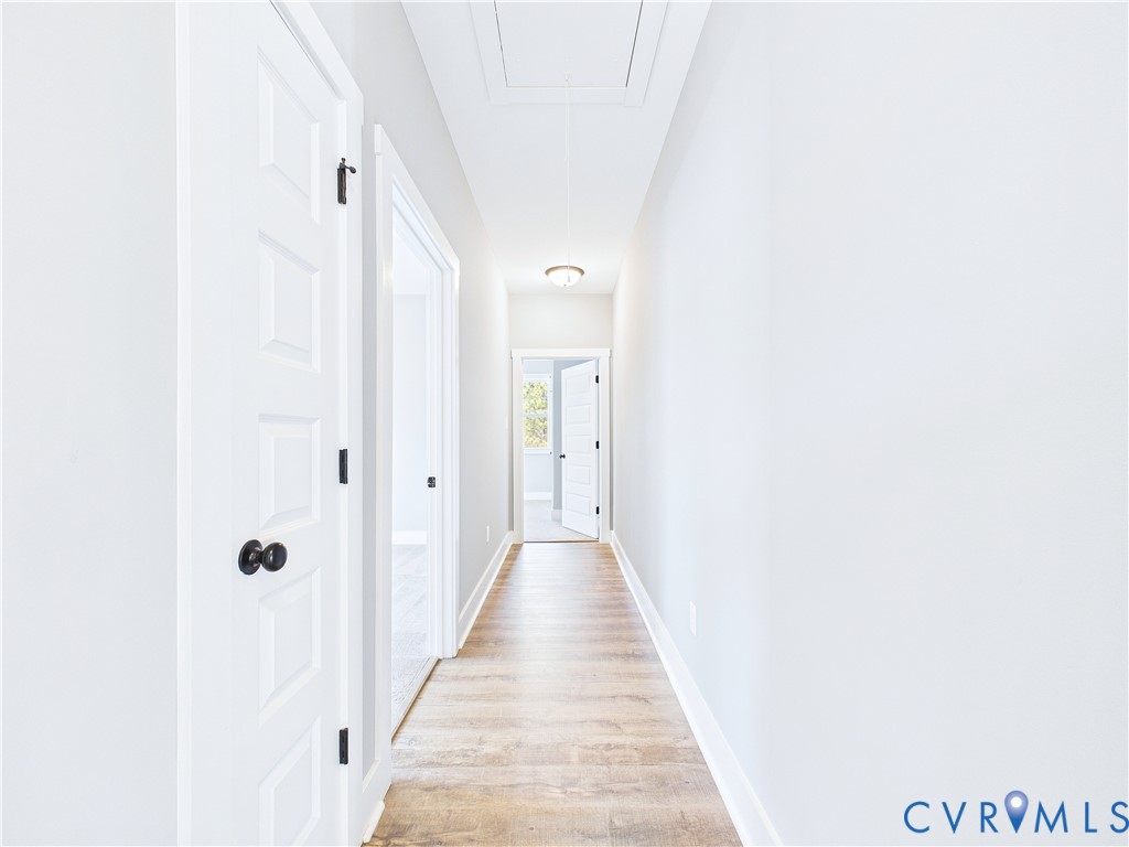 6795 Darlington Heights Road Cullen, VA 23934 - Photo 29 of 42 Corridor featuring attic access and light wood-typ