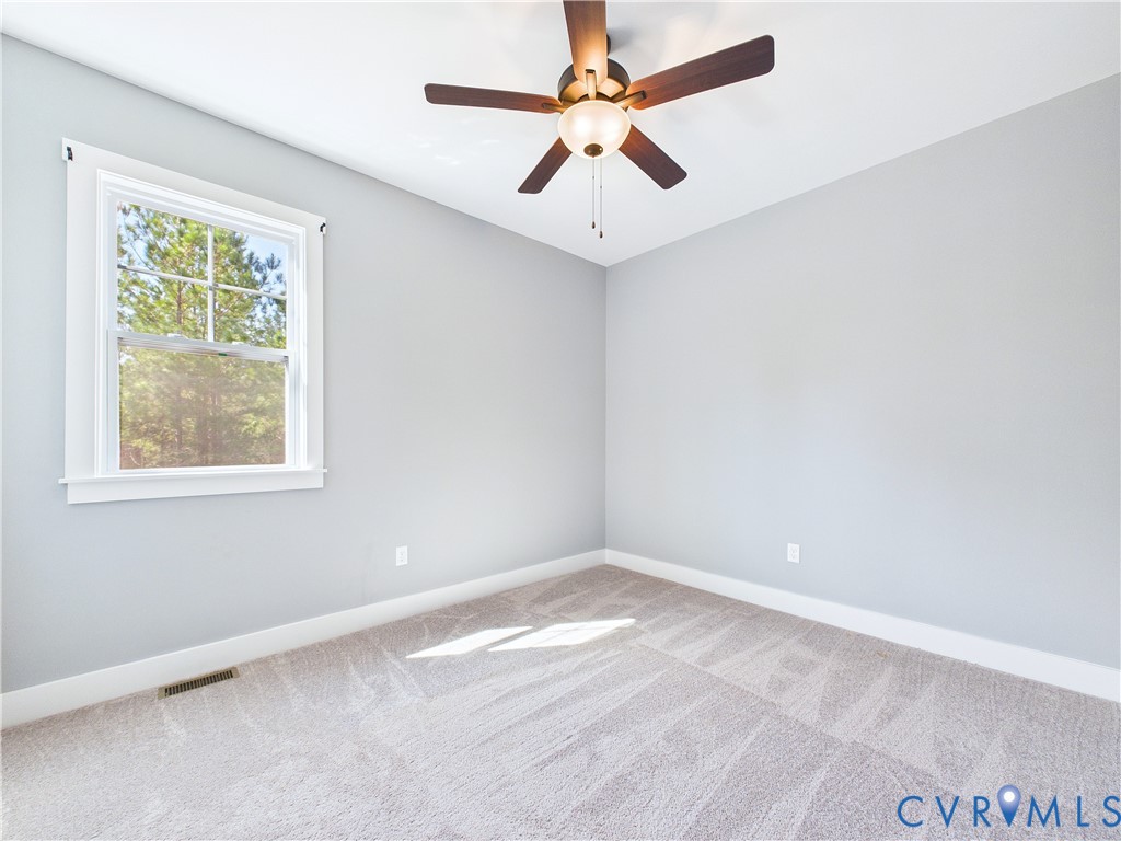 6795 Darlington Heights Road Cullen, VA 23934 - Photo 30 of 42 Spare room featuring ceiling fan and light colored
