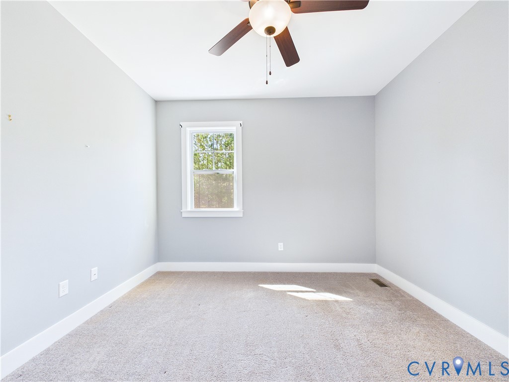 6795 Darlington Heights Road Cullen, VA 23934 - Photo 34 of 42 Carpeted spare room featuring baseboards and a cei