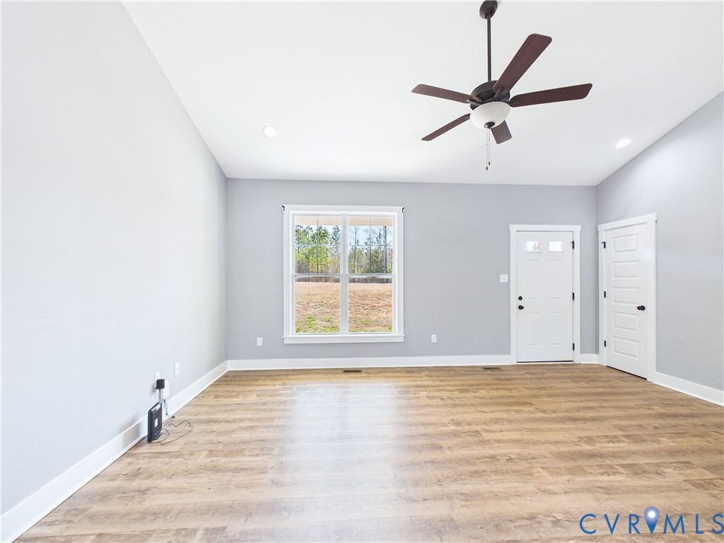 6795 Darlington Heights Road Cullen, VA 23934 - Photo 4 of 44 Empty room featuring light wood-type flooring, a c