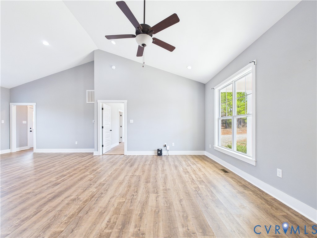 6795 Darlington Heights Road Cullen, VA 23934 - Photo 7 of 42 Unfurnished living room featuring light wood-style