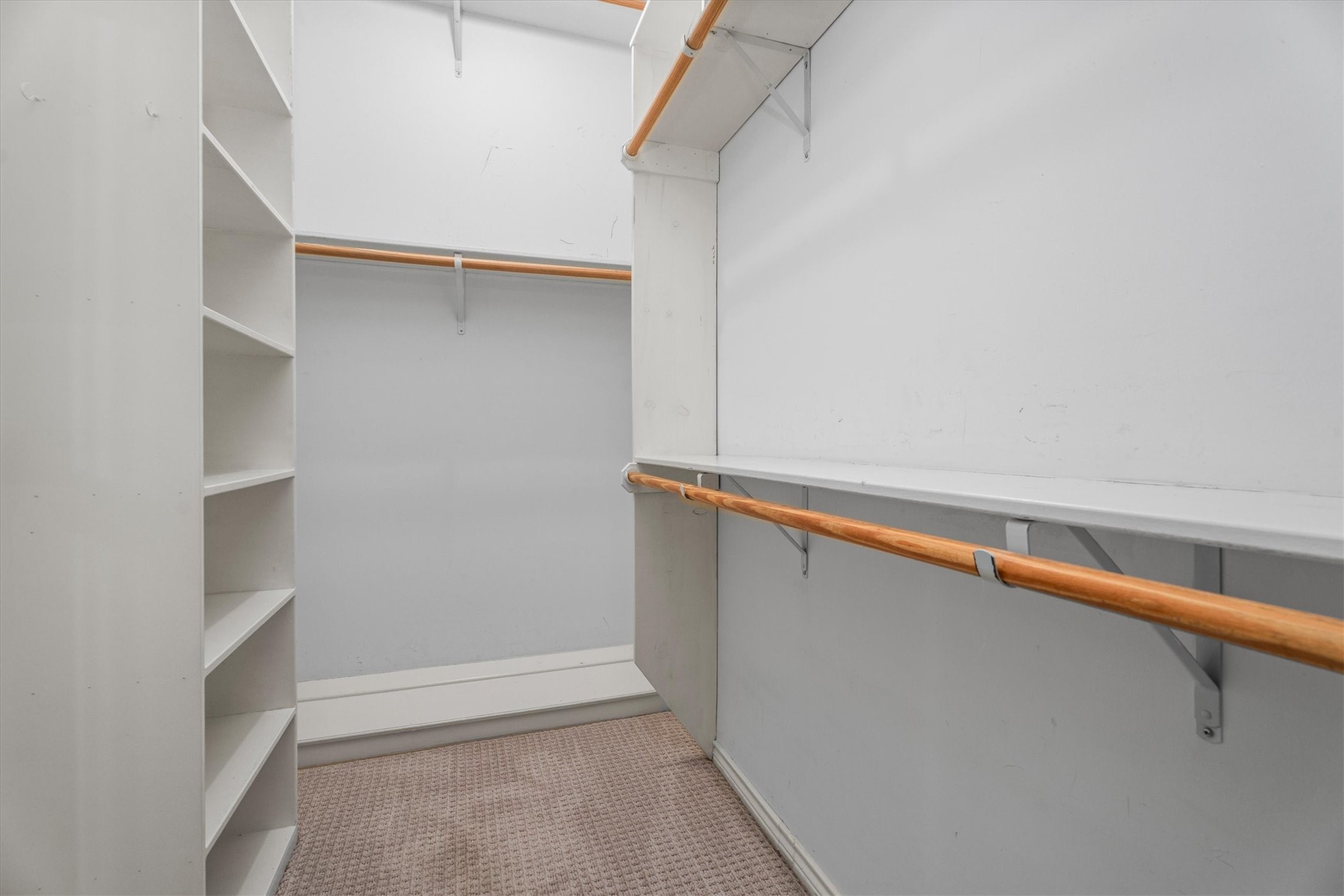 16267 Salmon Lane Spring, TX 77379 - Photo 25 of 48 This large walk-in closet offers ample shelving and storage for clothing and accessories.