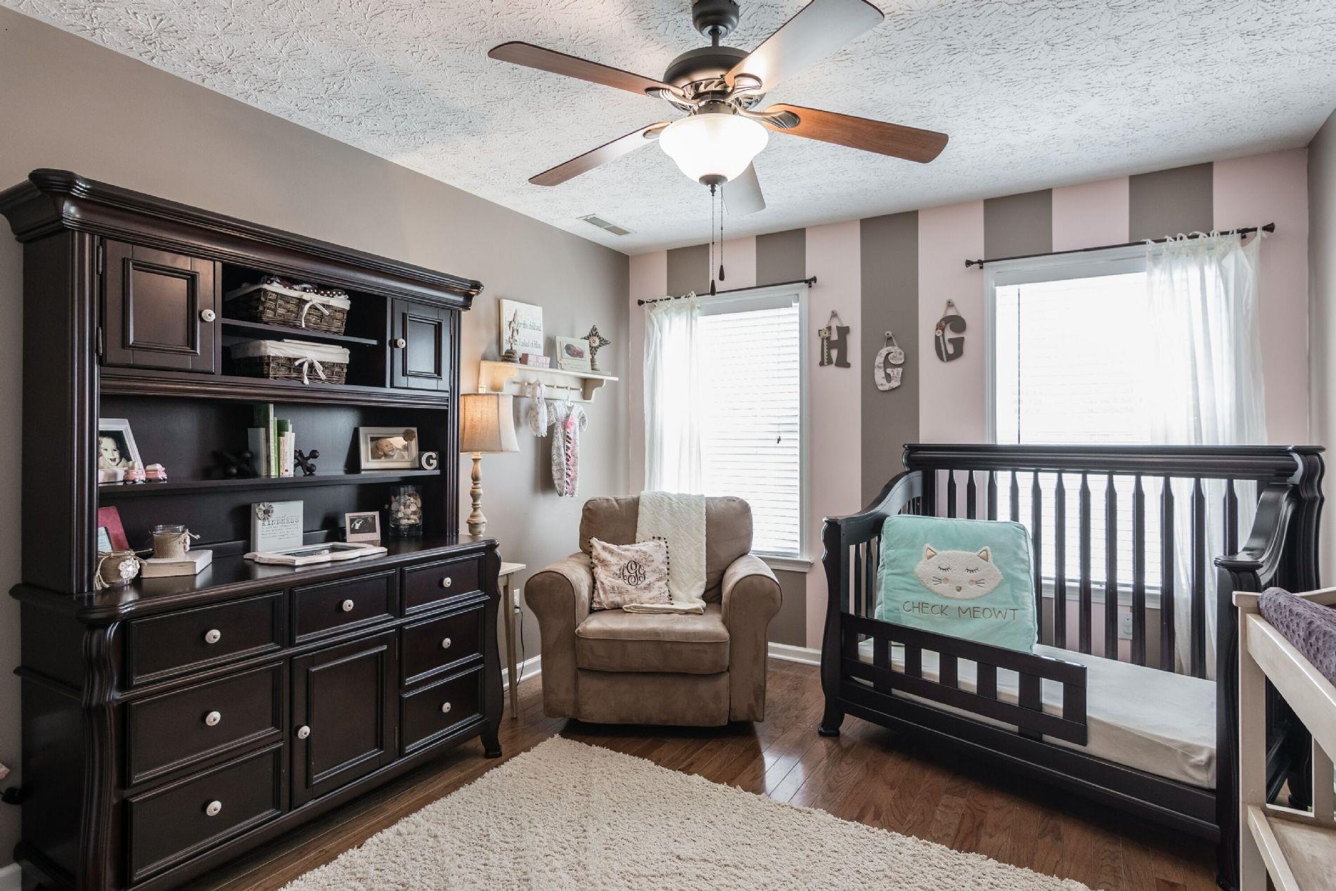 243 Village Green Road Gallatin, TN 37066 - Photo 20 of 24 a bedroom with furniture and a window