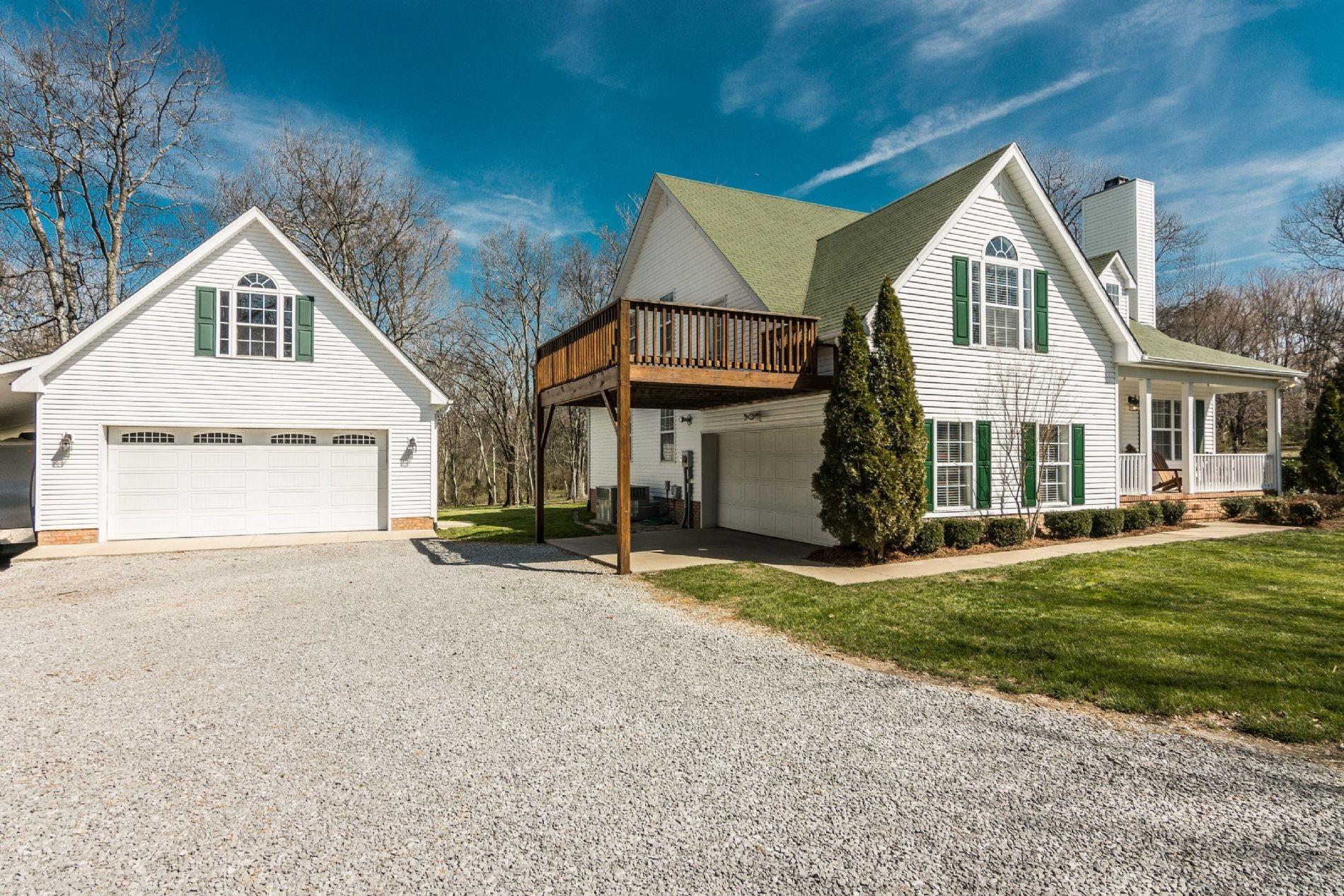 243 Village Green Road Gallatin, TN 37066 - Photo 4 of 24 a view of a yard in front of a house