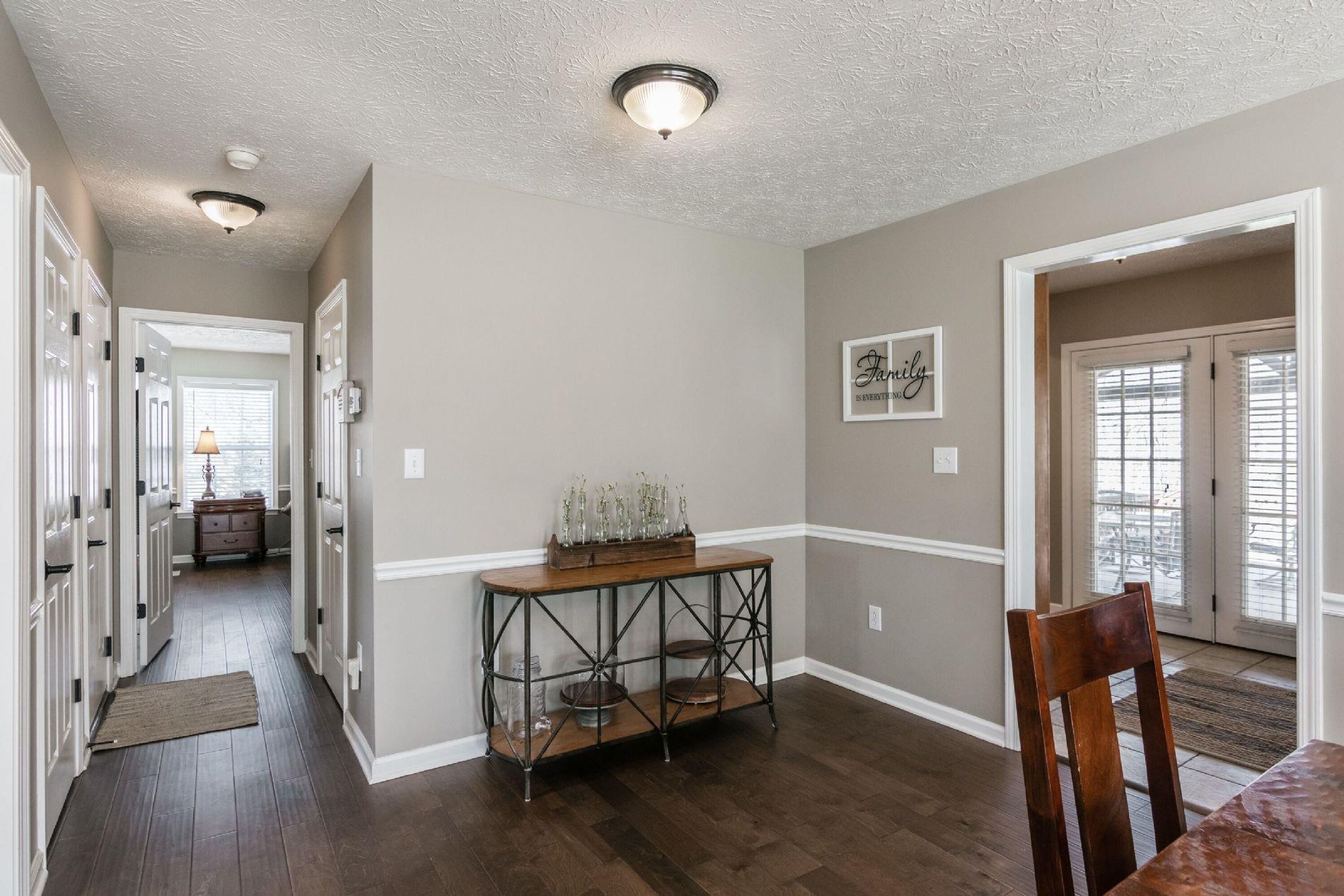 243 Village Green Road Gallatin, TN 37066 - Photo 9 of 24 a view of a room with furniture and wooden floor