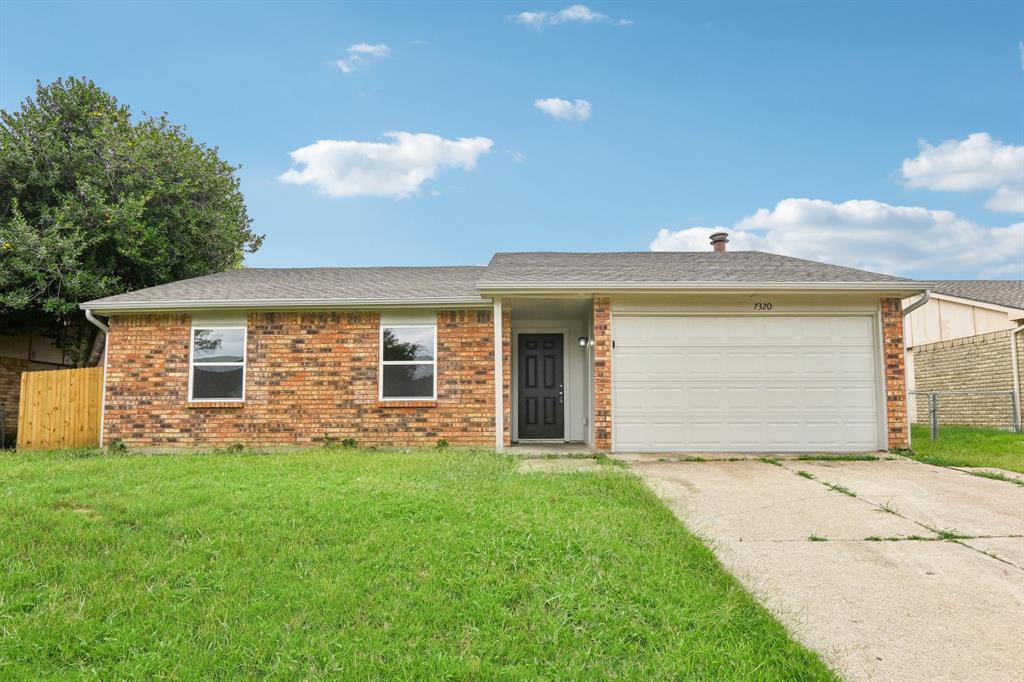 7320 Bluestem Road Dallas, TX 75249 - Photo 1 of 1 Ranch-style house featuring a front yard and a garage
