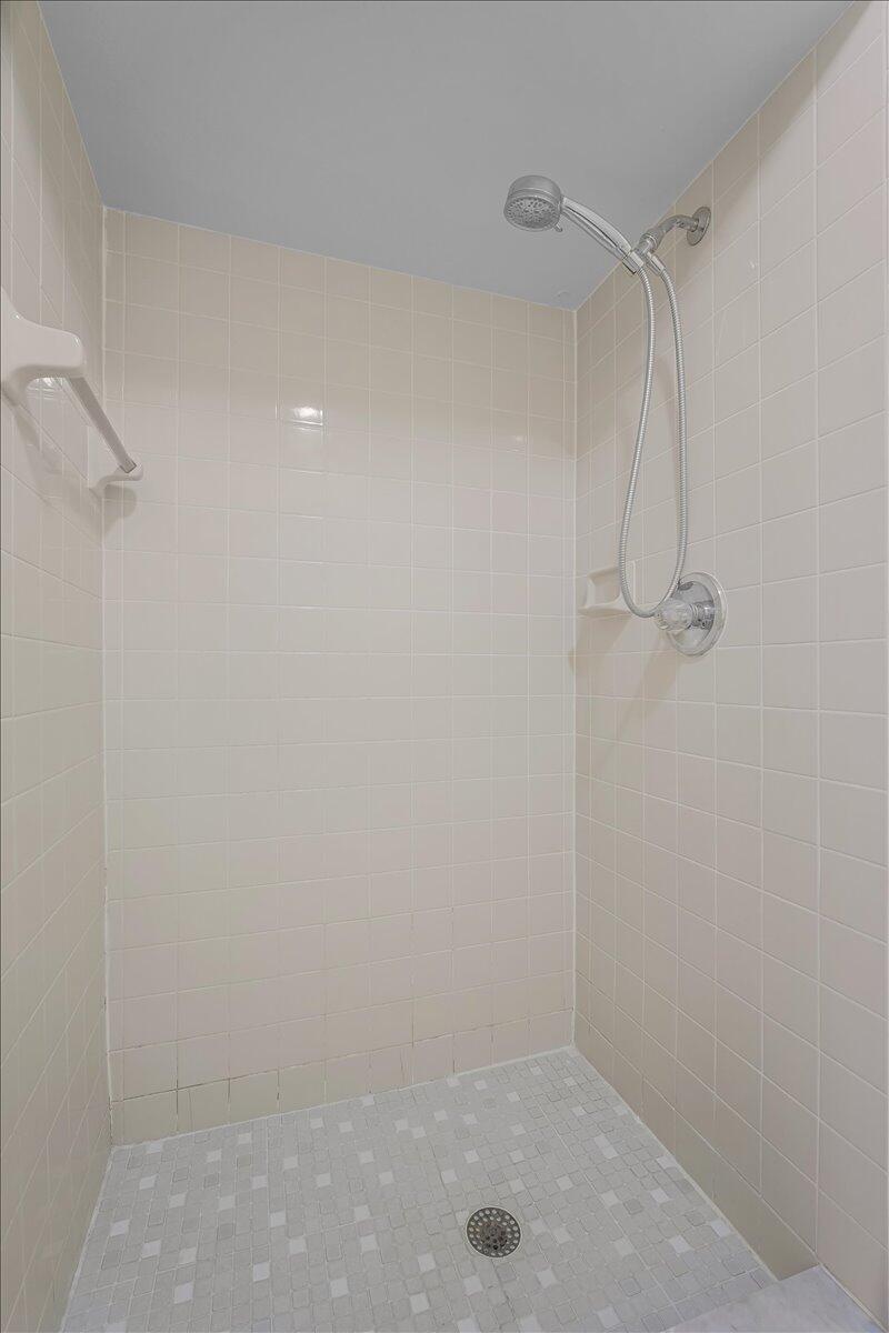 4514 Seattle Street Cocoa, FL 32927 - Photo 24 of 34 a bathroom with a shower