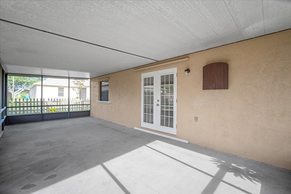 4514 Seattle Street Cocoa, FL 32927 - Photo 28 of 34 a view of an empty room with a window