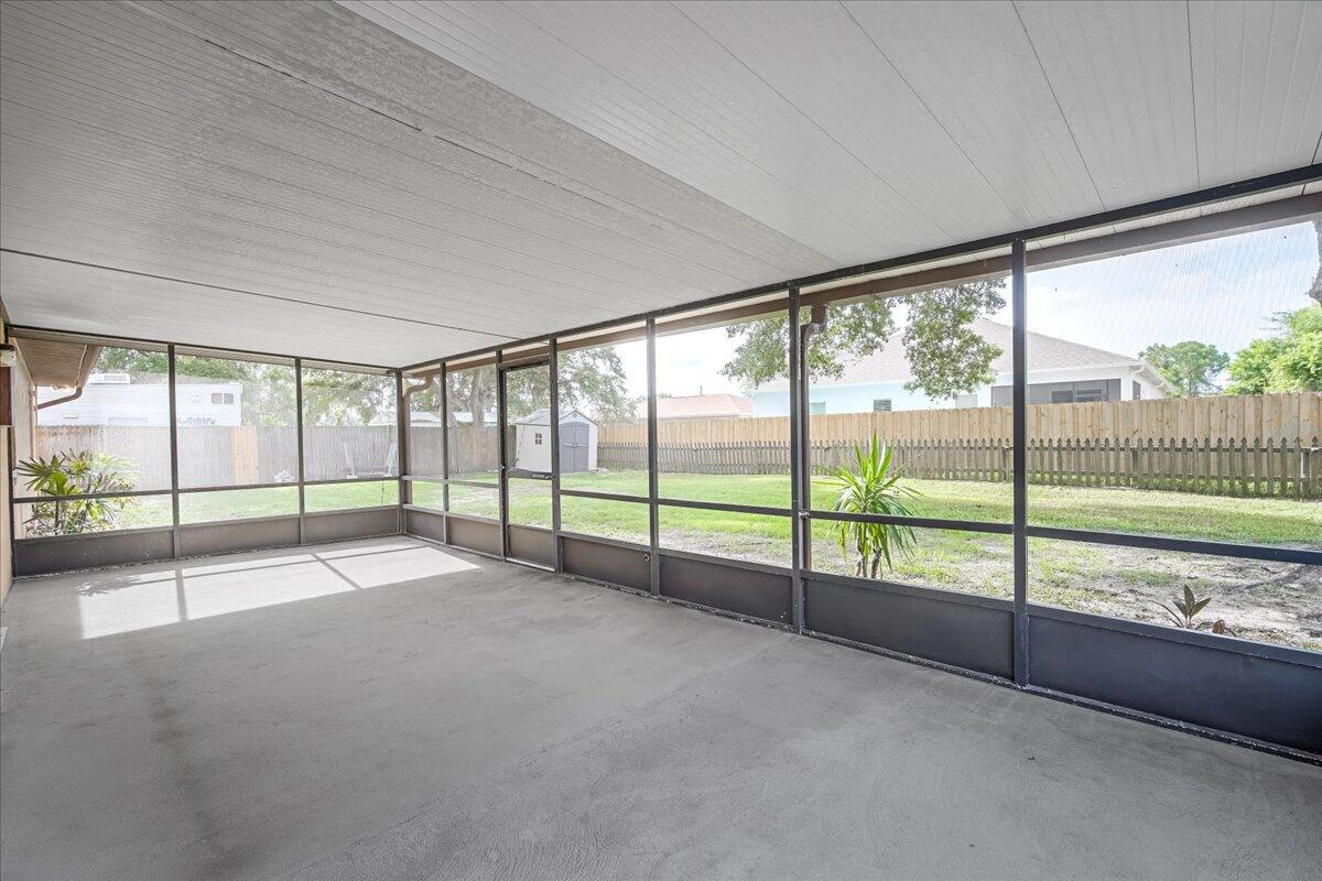 4514 Seattle Street Cocoa, FL 32927 - Photo 29 of 34 a view of an empty room with windows