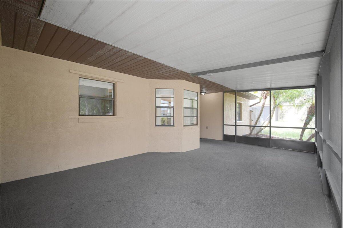 4514 Seattle Street Cocoa, FL 32927 - Photo 8 of 34 an empty room with windows