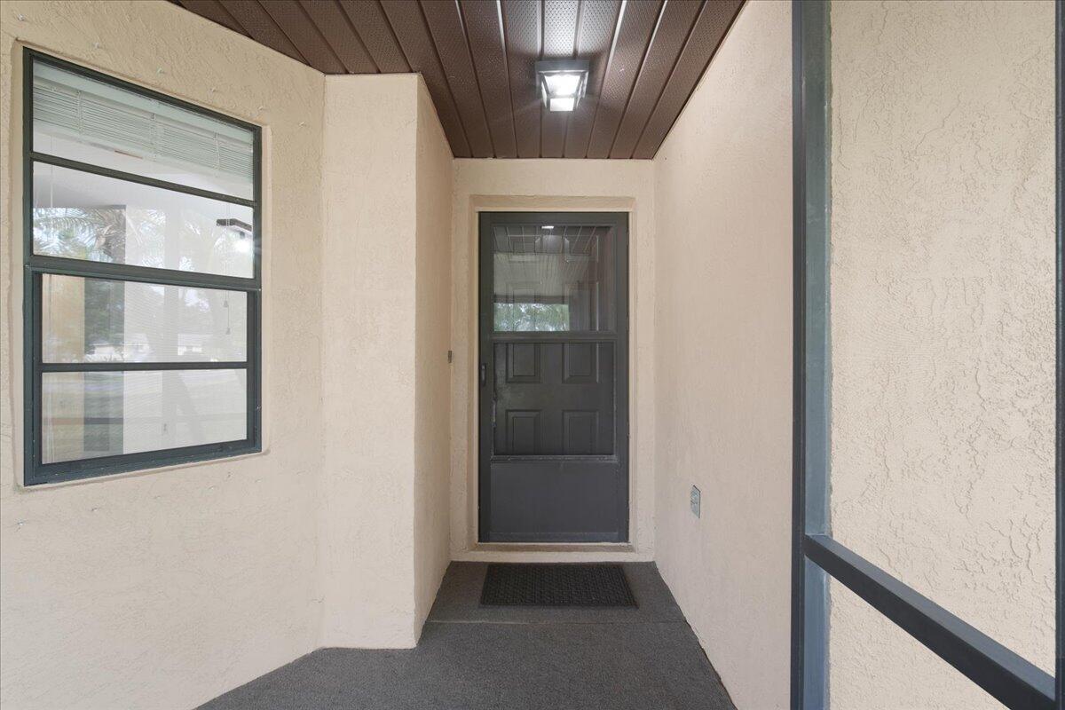 4514 Seattle Street Cocoa, FL 32927 - Photo 10 of 34 a view of a hallway