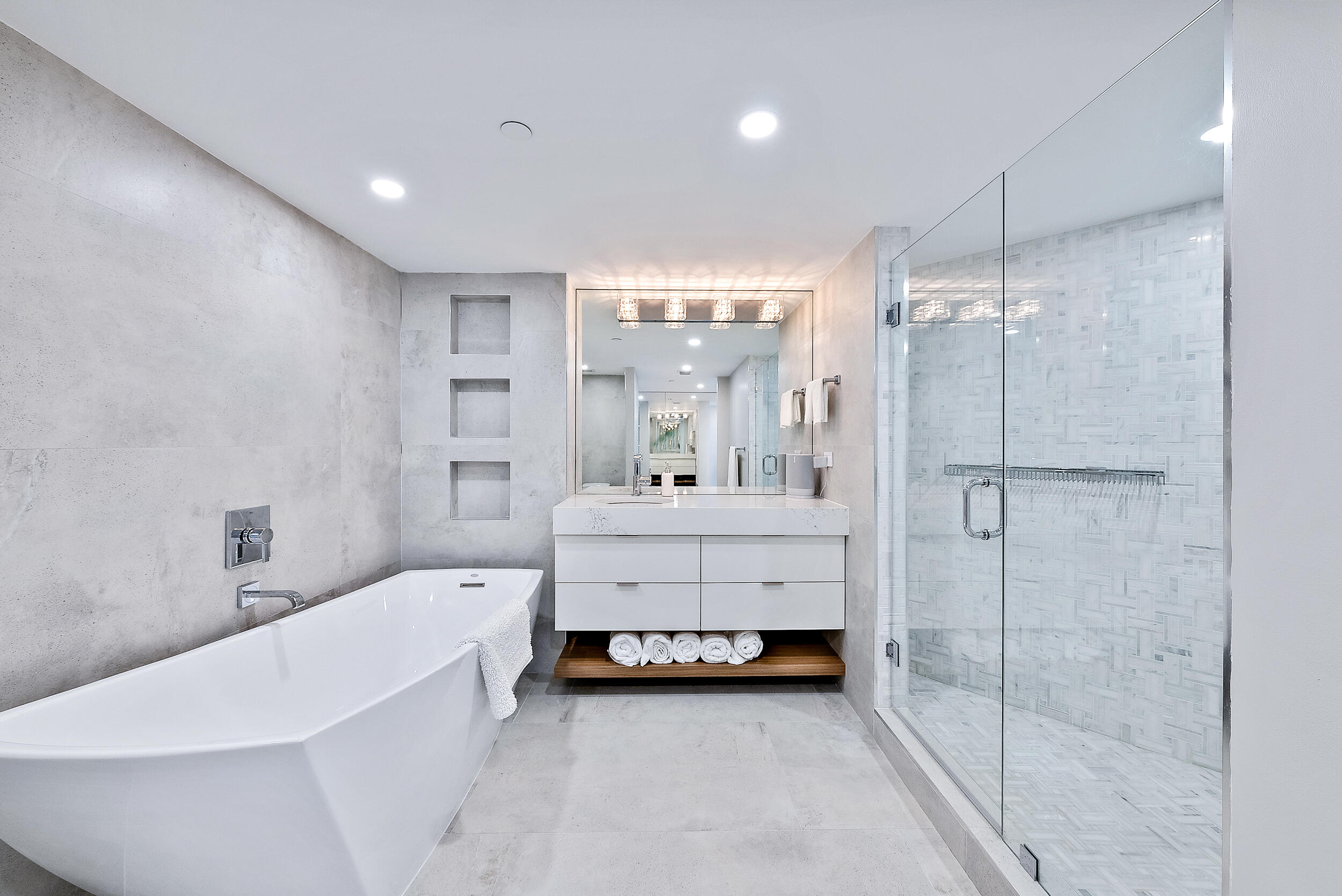 5200 North Ocean Drive, Unit 2003 Singer Island, FL 33404 - Photo 18 of 40 a bathroom with a bathtub and a shower