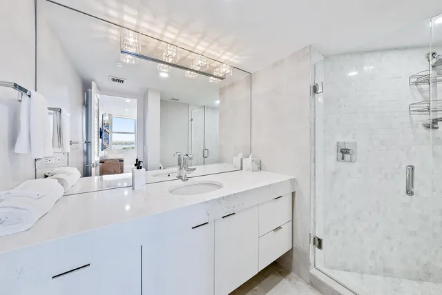 a view of a balcony with an ocean view