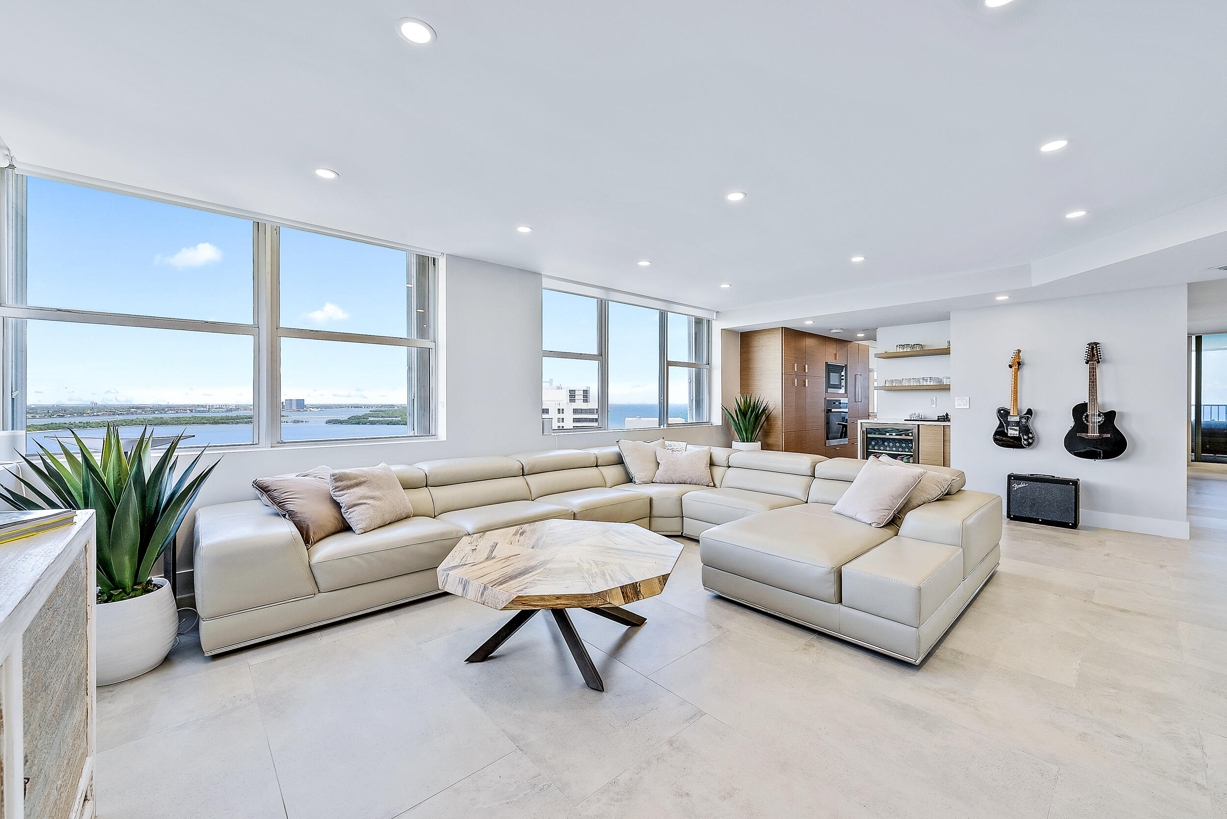 5200 North Ocean Drive, Unit 2003 Singer Island, FL 33404 - Photo 9 of 40 a living room with furniture and a large window
