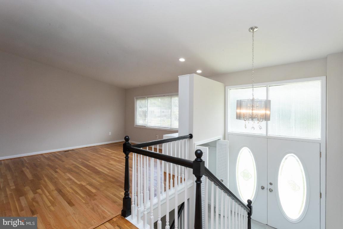 816 Hopewood Road Baltimore, MD 21208 - Photo 3 of 41 Beautiful Double Doors and chandelier