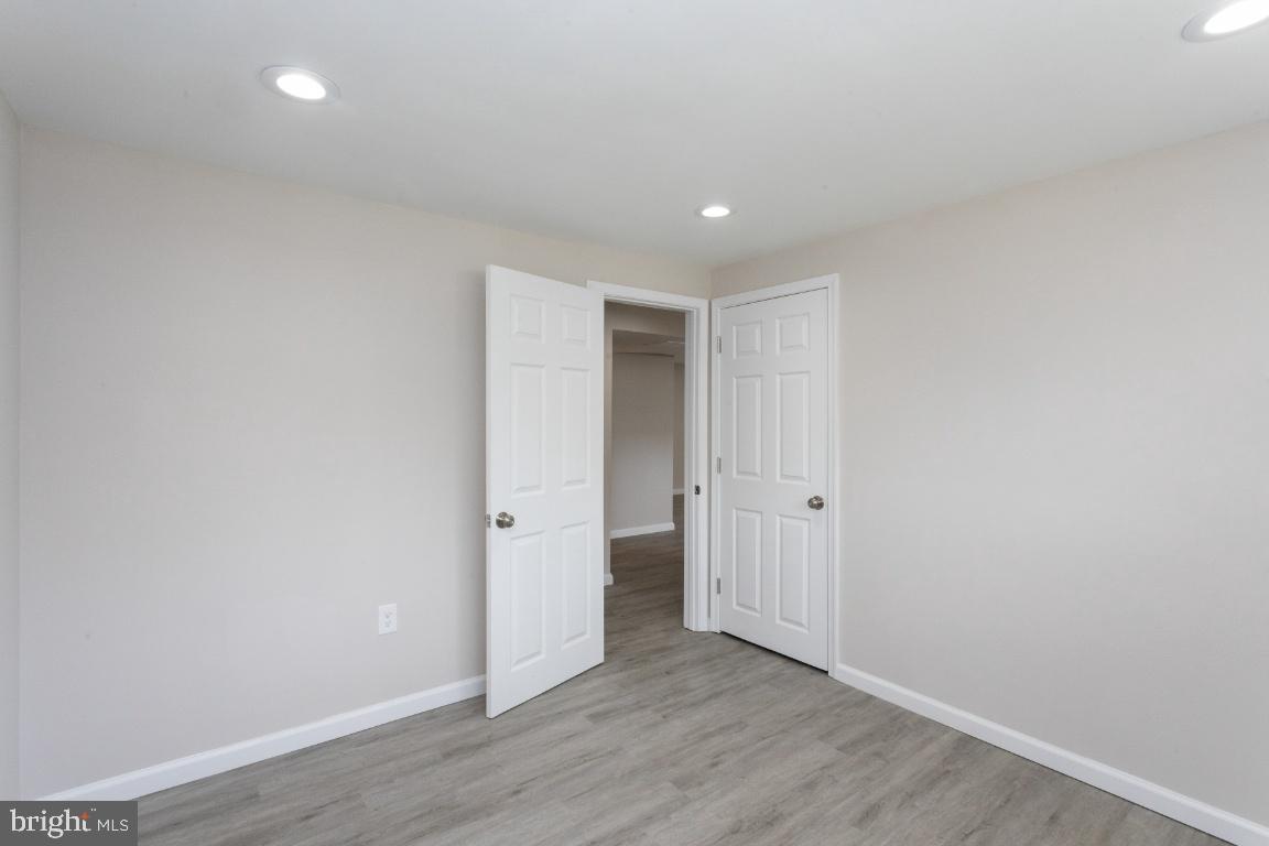 816 Hopewood Road Baltimore, MD 21208 - Photo 31 of 41 10'x10 ' lower level bedroom