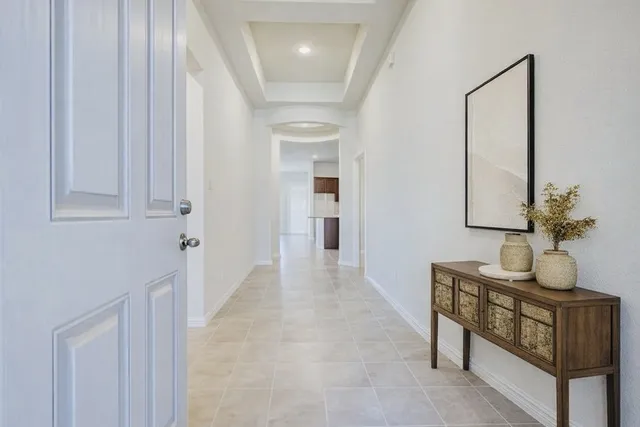 a view of a hallway with workspace