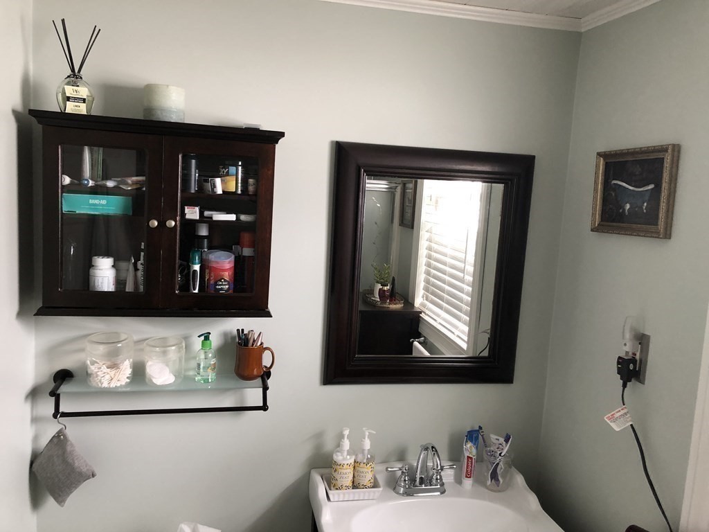 430 Hope Street Fall River, MA 02721 - Photo 14 of 28 a bathroom with a sink and a mirror