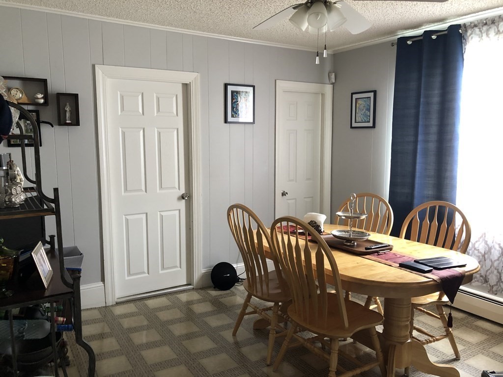 430 Hope Street Fall River, MA 02721 - Photo 5 of 28 a view of a dining room with furniture and a window