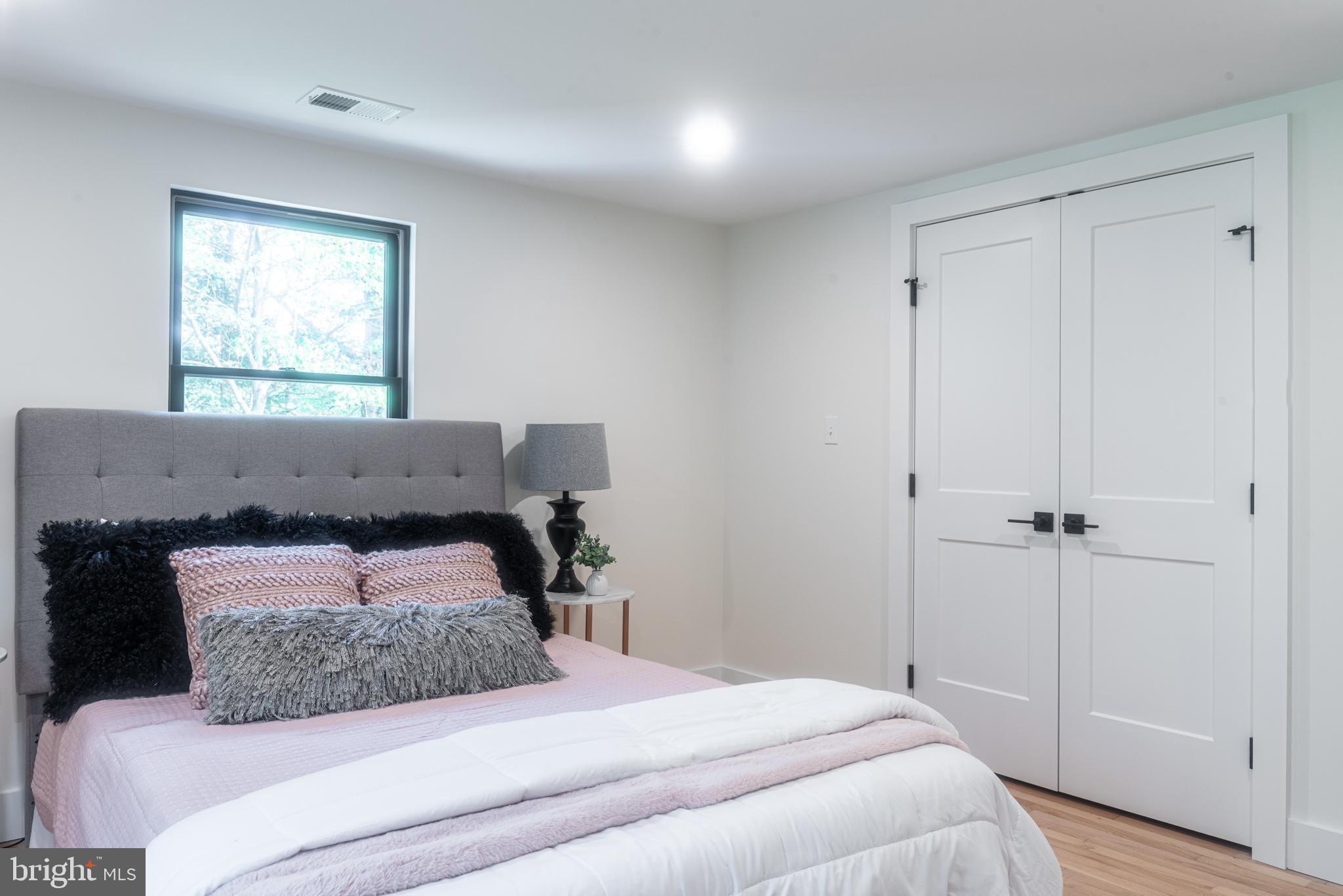 933 Forrest Road Sellersville, PA 18960 - Photo 30 of 56 a bedroom with a bed and a window