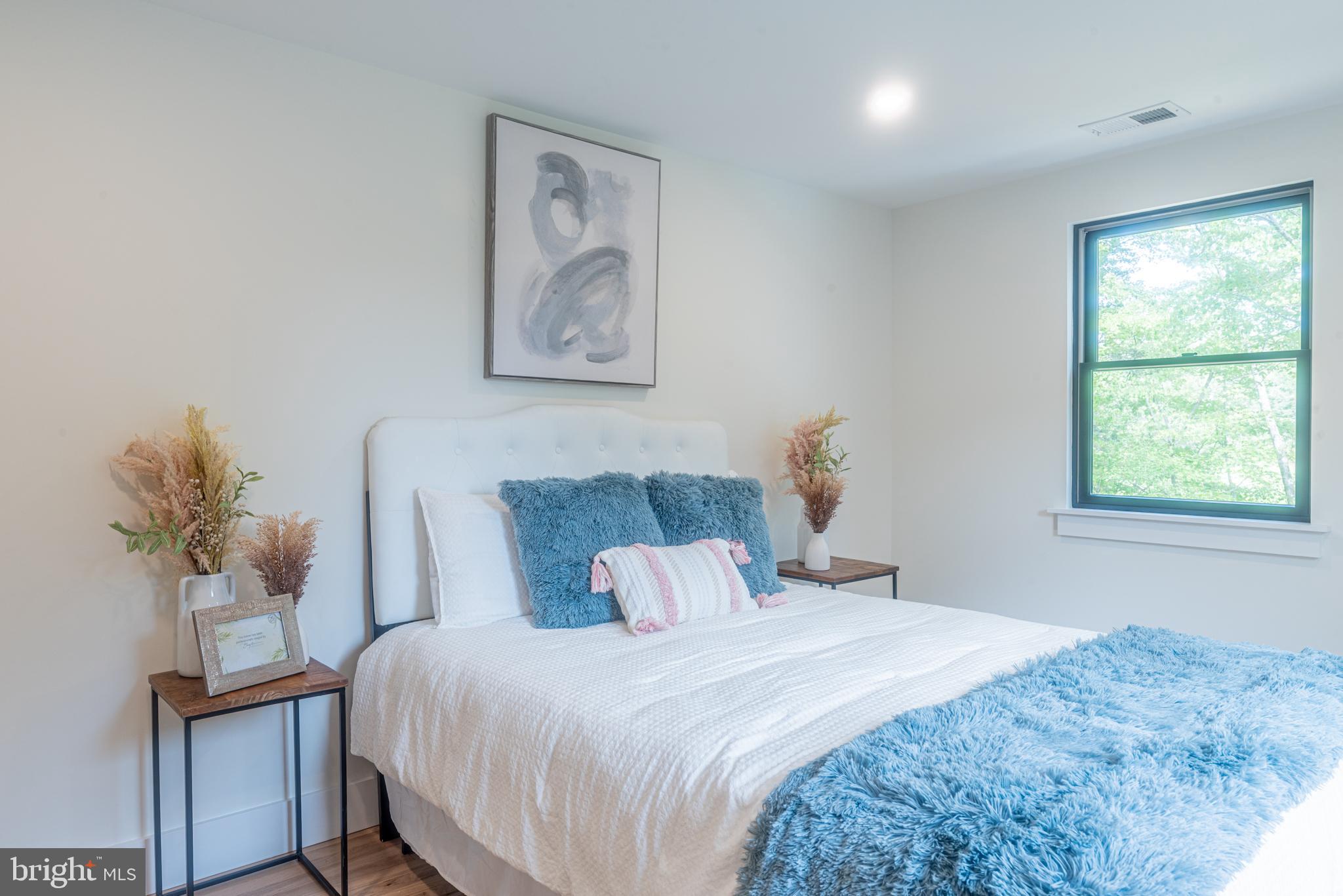 933 Forrest Road Sellersville, PA 18960 - Photo 35 of 56 a bedroom with a bed and a window