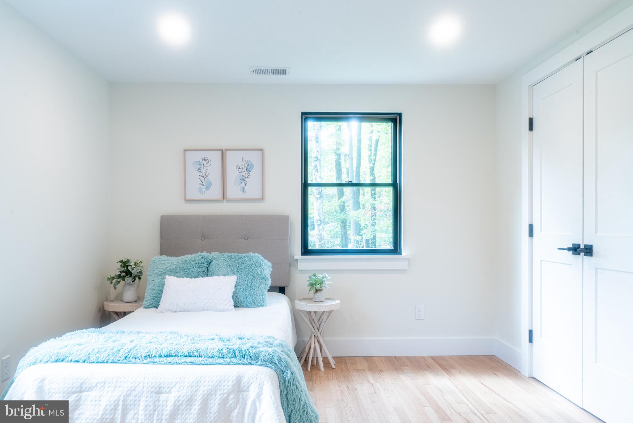 933 Forrest Road Sellersville, PA 18960 - Photo 39 of 56 a bedroom with a bed and a window