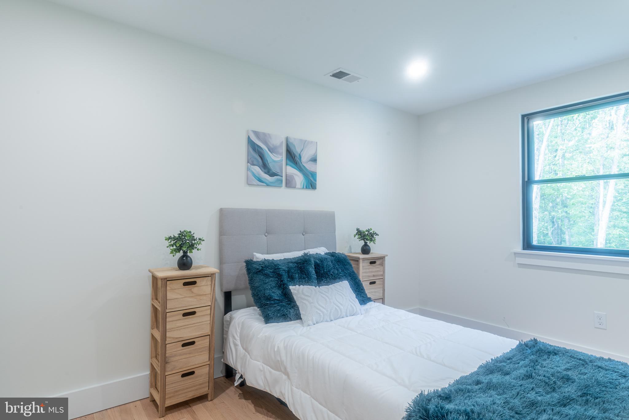 933 Forrest Road Sellersville, PA 18960 - Photo 41 of 56 a bedroom with a bed and a window
