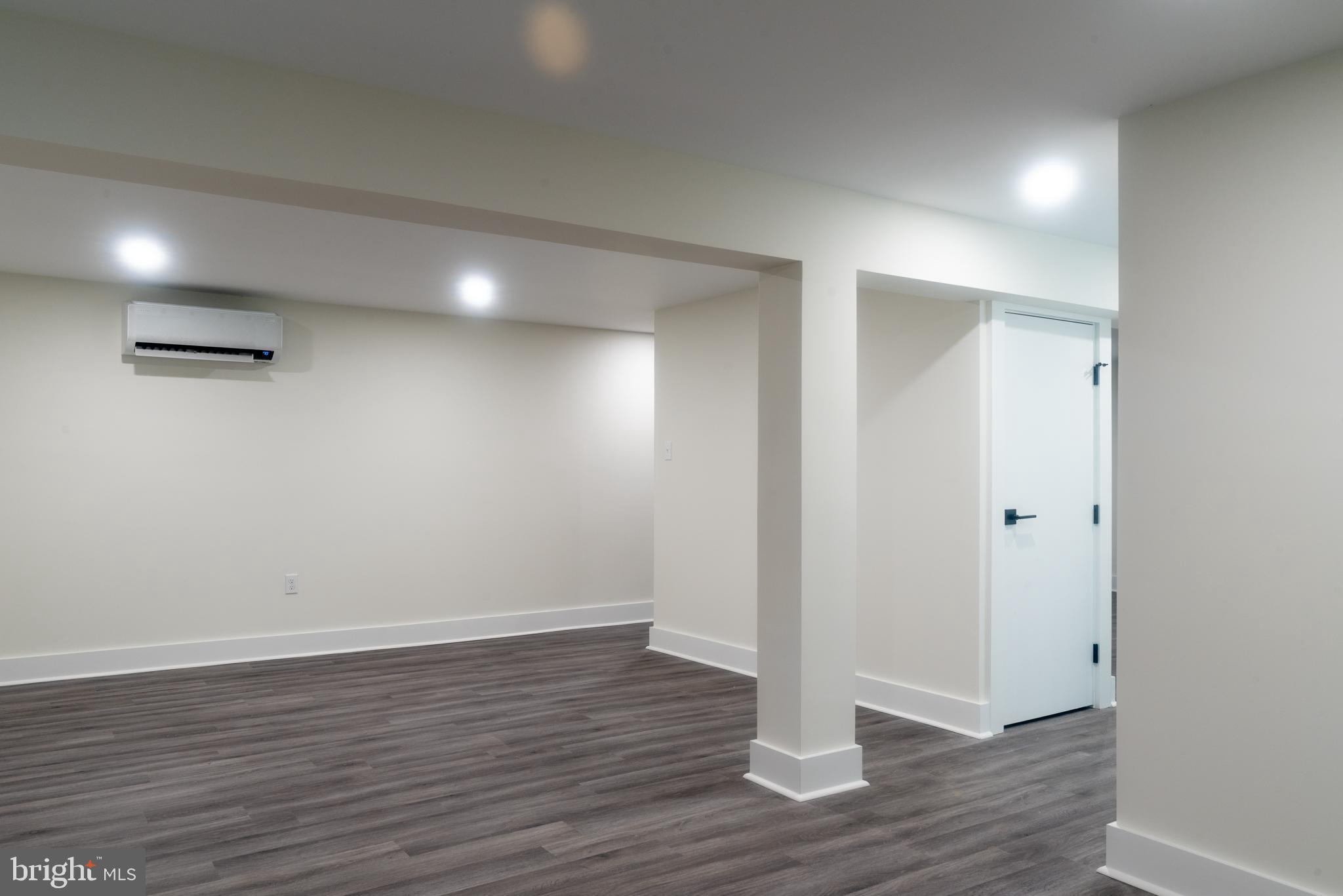 933 Forrest Road Sellersville, PA 18960 - Photo 44 of 56 a view of an empty room with wooden floor