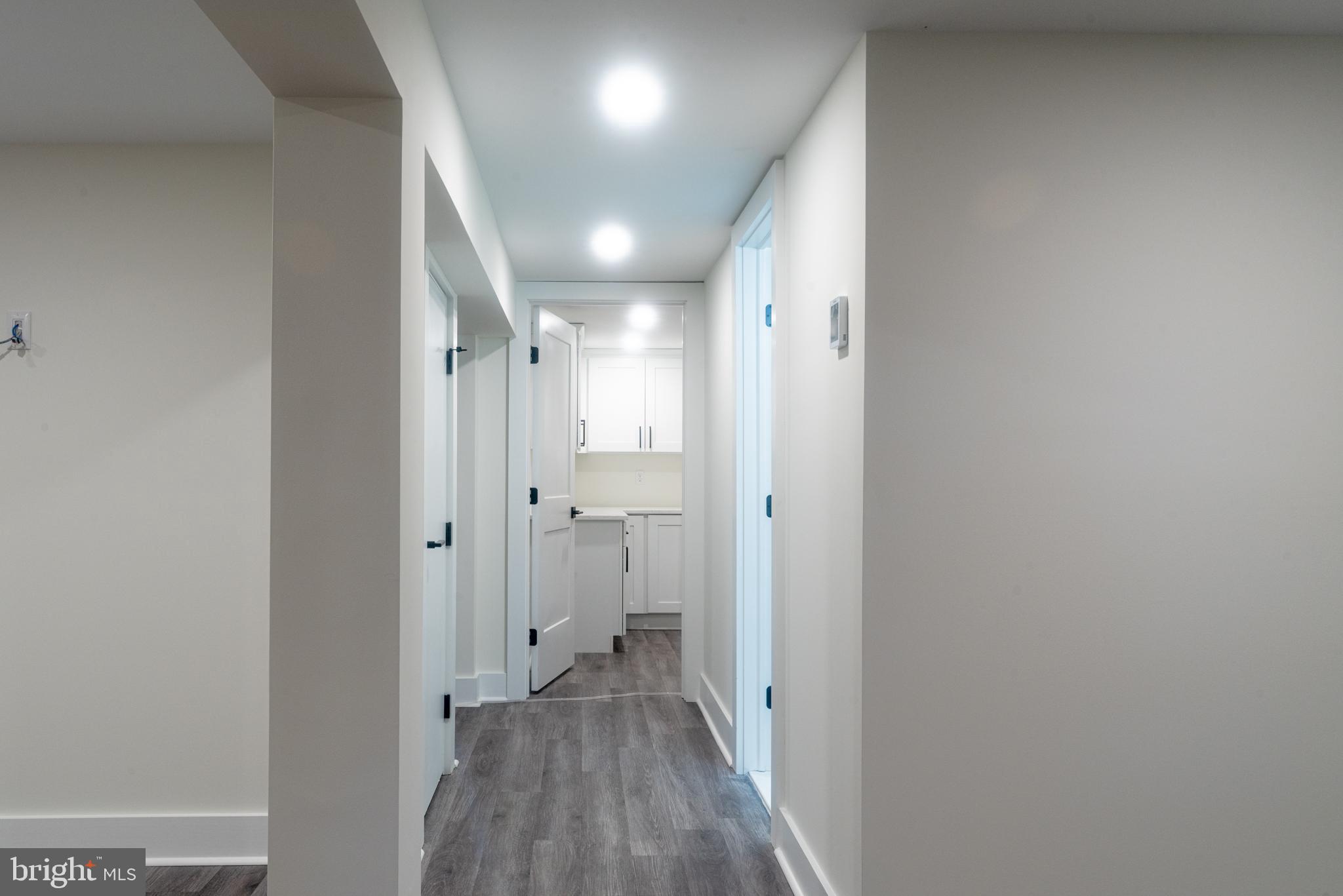 933 Forrest Road Sellersville, PA 18960 - Photo 45 of 56 a view of a hallway with wooden floor