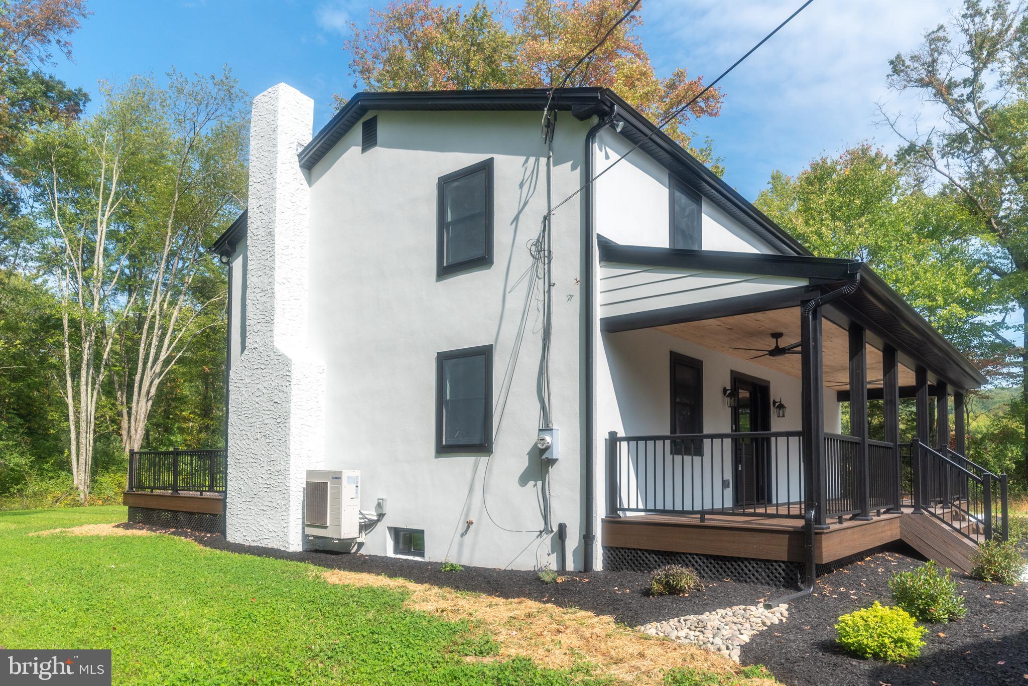 933 Forrest Road Sellersville, PA 18960 - Photo 53 of 56 a front view of a house with garden
