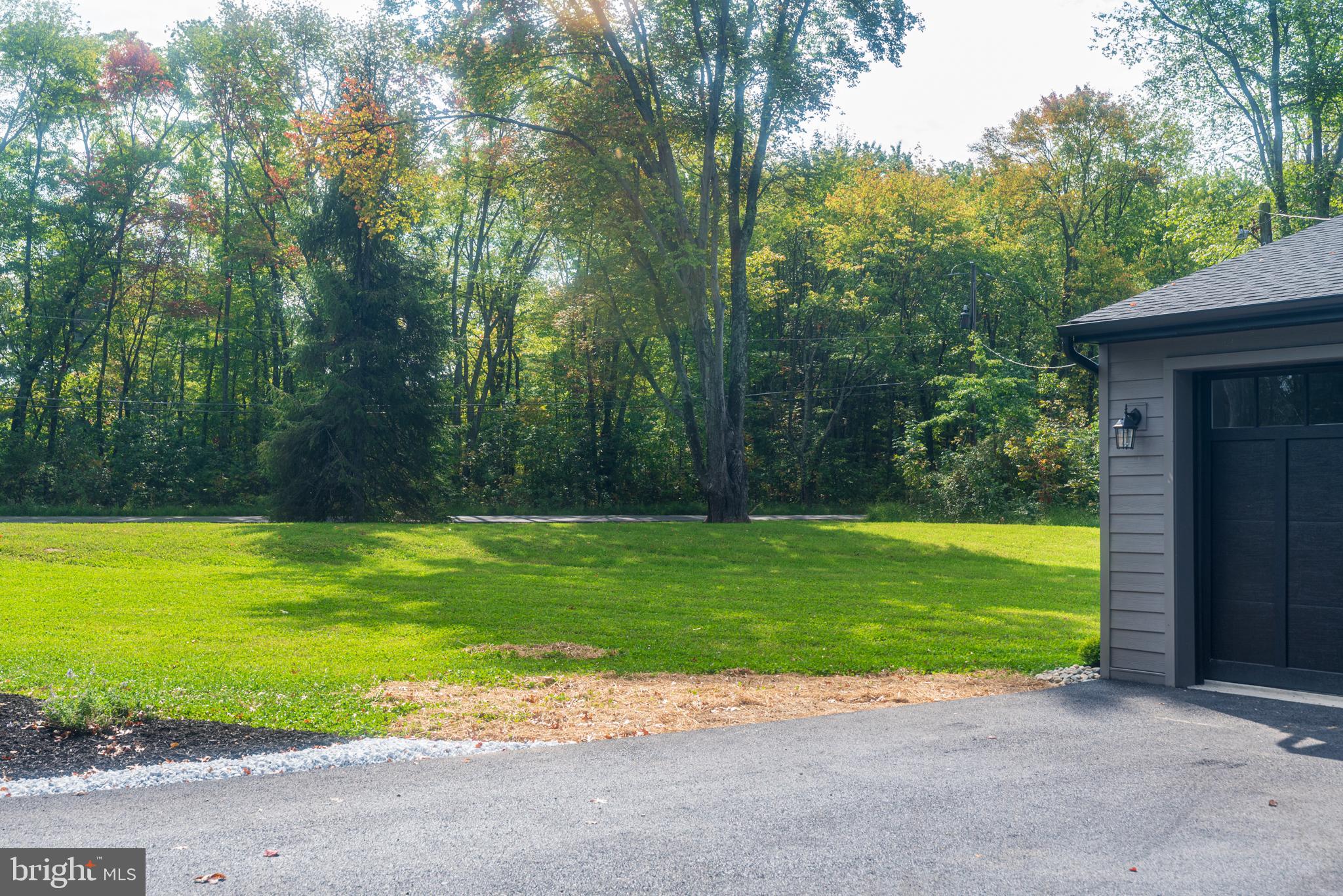 933 Forrest Road Sellersville, PA 18960 - Photo 54 of 56 a view of a pool with a yard and a trees