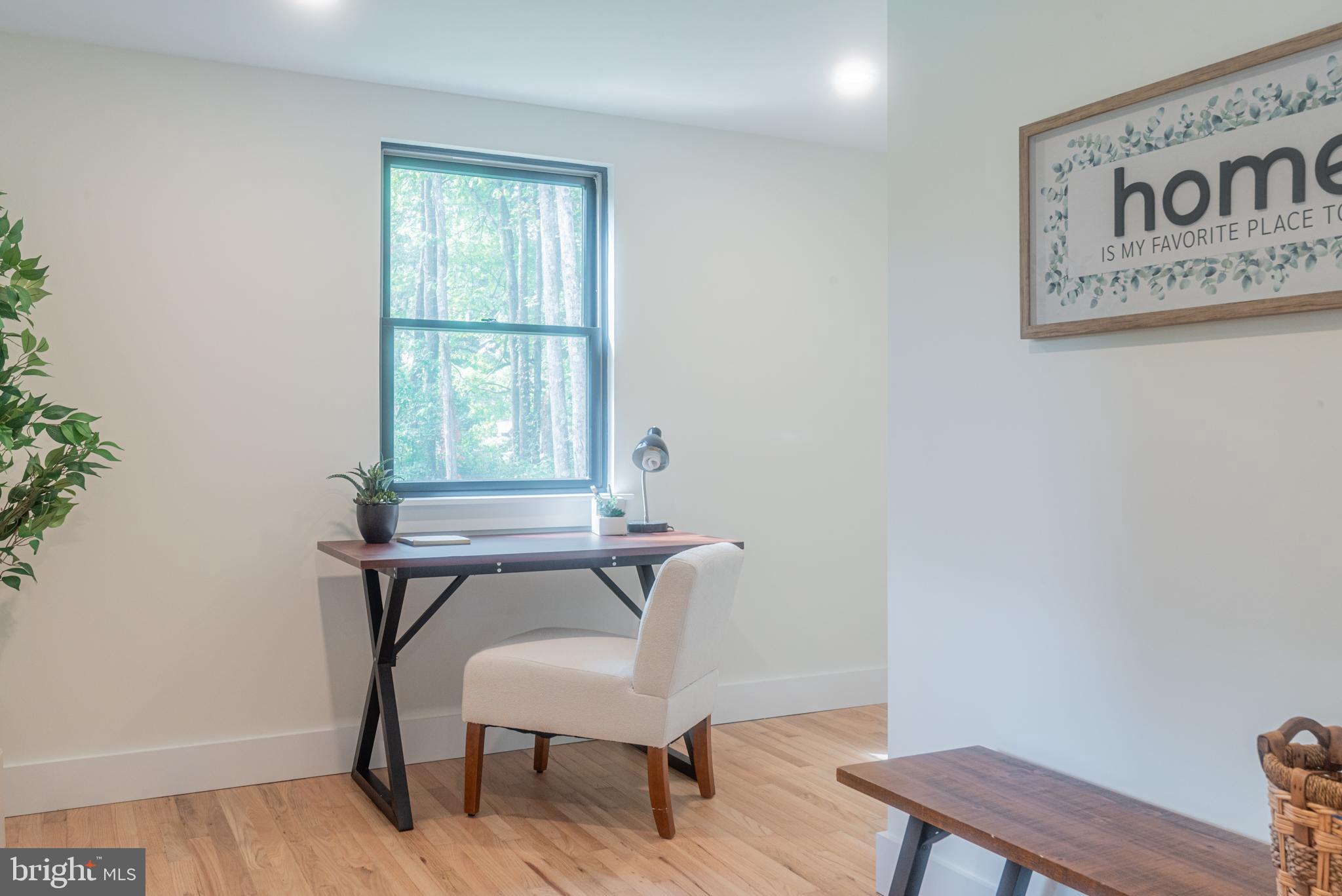 933 Forrest Road Sellersville, PA 18960 - Photo 6 of 56 a view of a workspace with furniture and a window