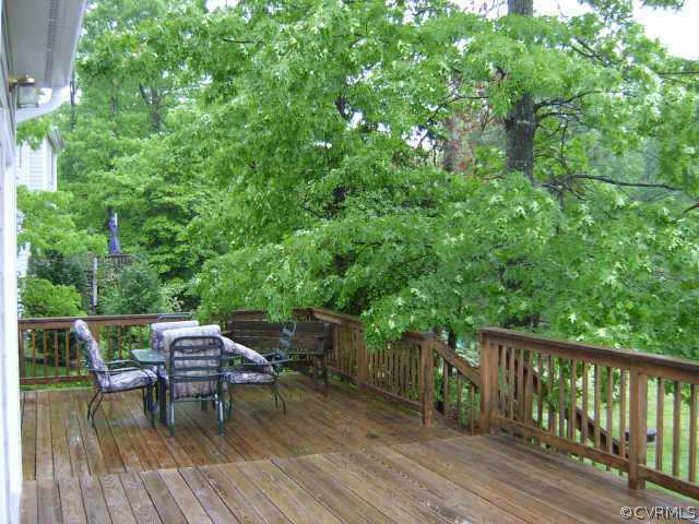 11630 Stephens Point Drive Chester, VA 23831 - Photo 9 of 10 a view of backyard with a deck and hardwood floor